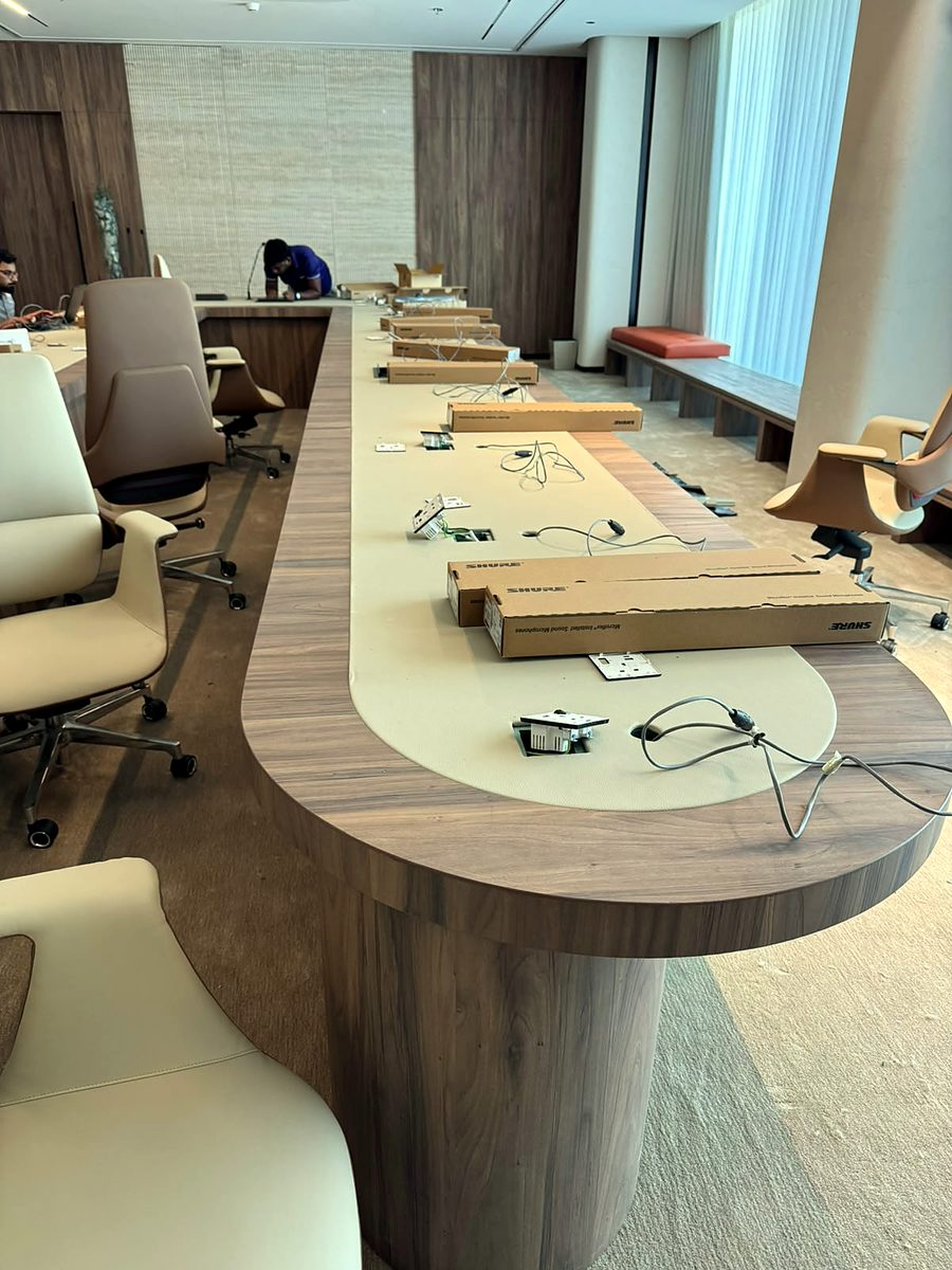 Boardroom table fitted with power and data points for an office